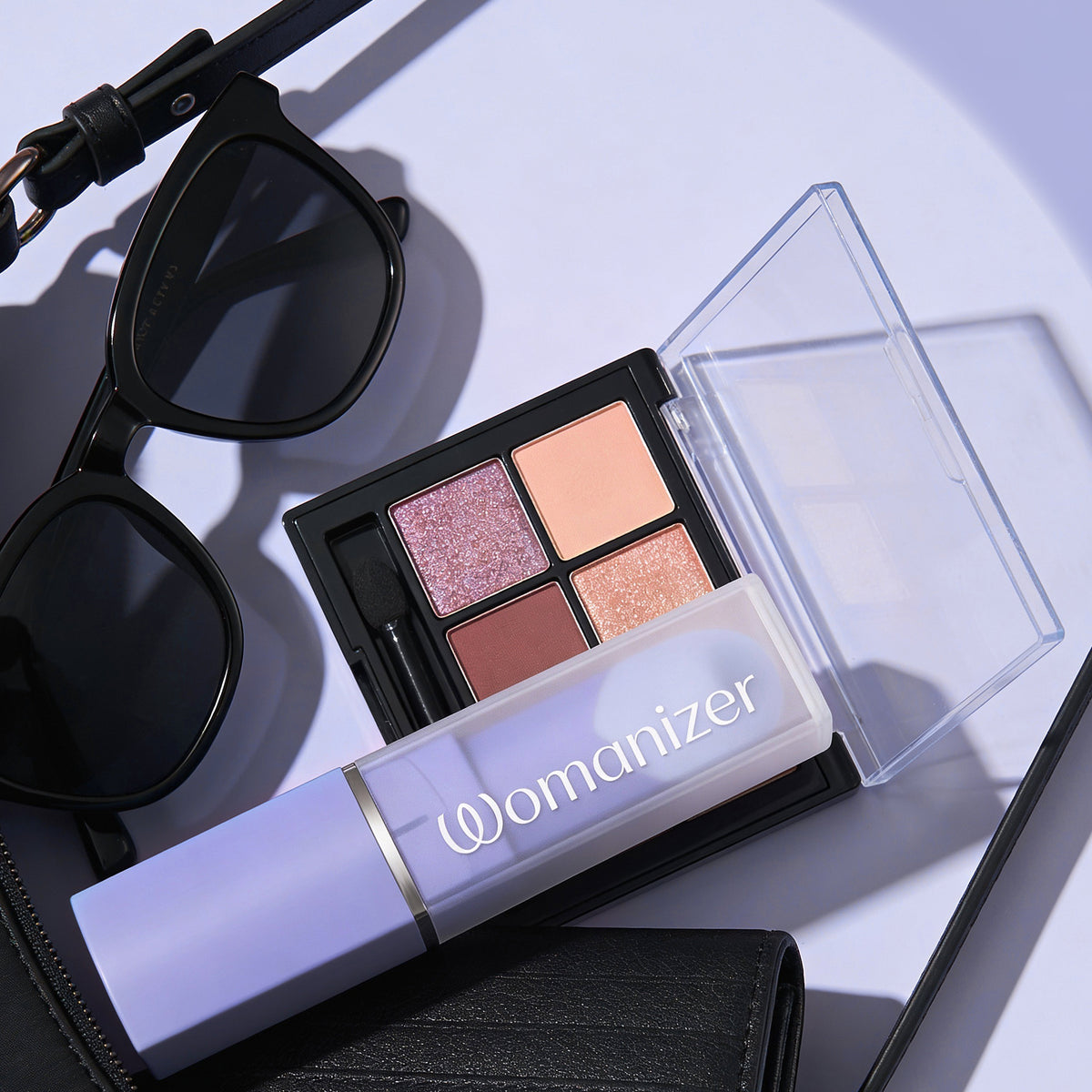 Womanizer Beauty Pleasure Air Lipstick Stimulator in Lilac